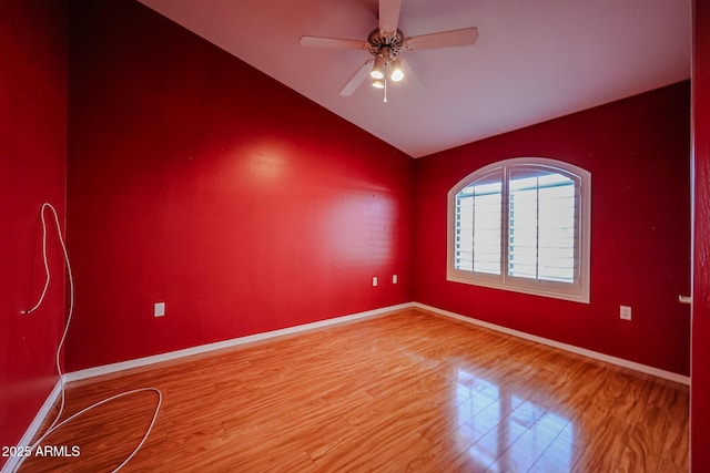 5249 E Shea Blvd Unit 215, Scottsdale, AZ 85254 - unfurnished room featuring vaulted ceiling, light wood-style flooring, and a ceiling fan