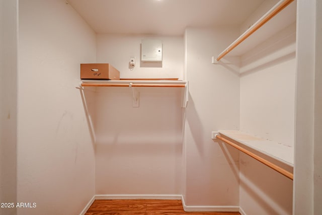 5249 E Shea Blvd Unit 215, Scottsdale, AZ 85254 - spacious closet with wood finished floors