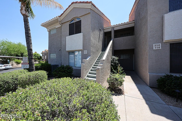 5249 E Shea Blvd Unit 215, Scottsdale, AZ 85254 - view of building exterior with stairway