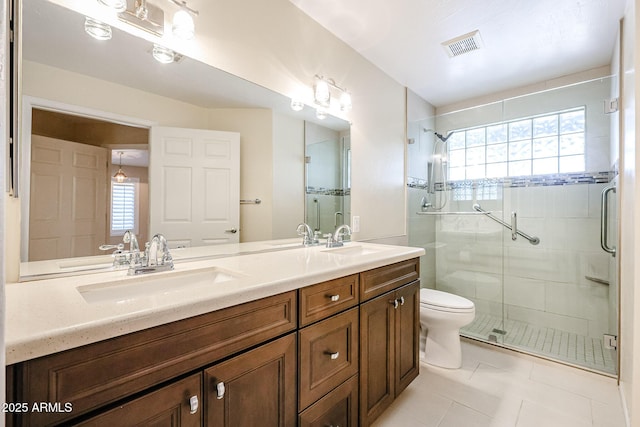5249 E Shea Blvd Unit 215, Scottsdale, AZ 85254 - full bathroom featuring a stall shower, tile patterned flooring, and double vanity