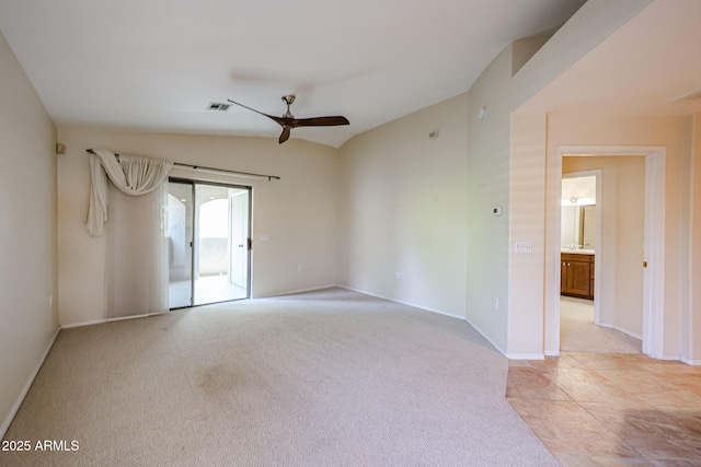 5249 E Shea Blvd Unit 215, Scottsdale, AZ 85254 - empty room with ceiling fan, vaulted ceiling, and light colored carpet