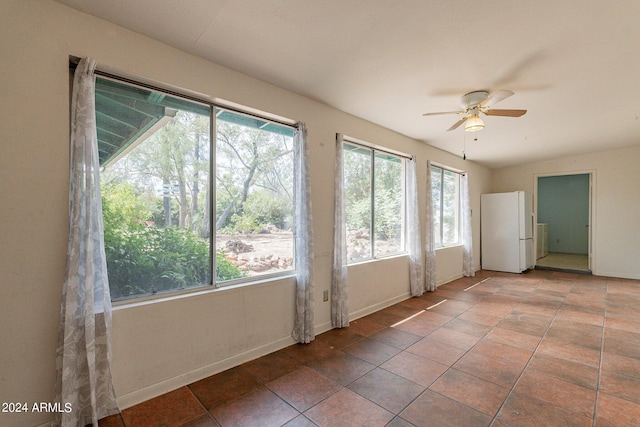 interior space featuring ceiling fan