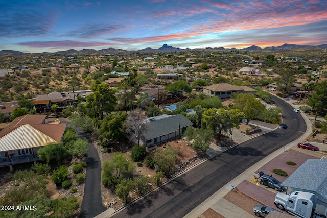 aerial view at dusk with a mountain view