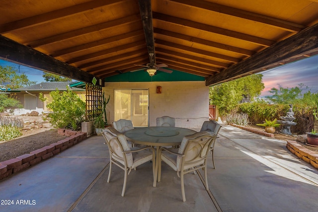 view of patio terrace at dusk