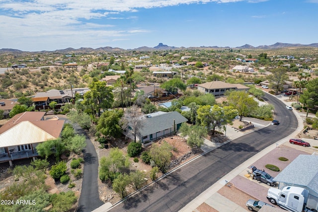 birds eye view of property featuring a mountain view