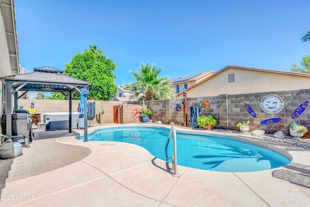 46068 W Guilder Ave, Maricopa, AZ 85139 - view of swimming pool featuring a fenced backyard, a patio area, a hot tub, and a gazebo