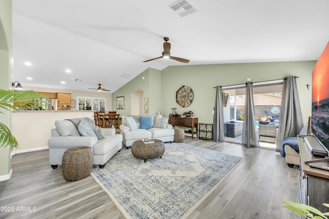 46068 W Guilder Ave, Maricopa, AZ 85139 - living room with ceiling fan, healthy amount of natural light, light wood finished floors, lofted ceiling, and recessed lighting