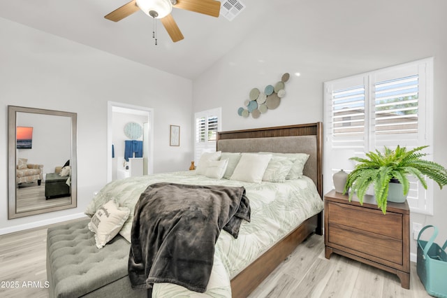 46068 W Guilder Ave, Maricopa, AZ 85139 - bedroom with light wood finished floors, high vaulted ceiling, and ceiling fan