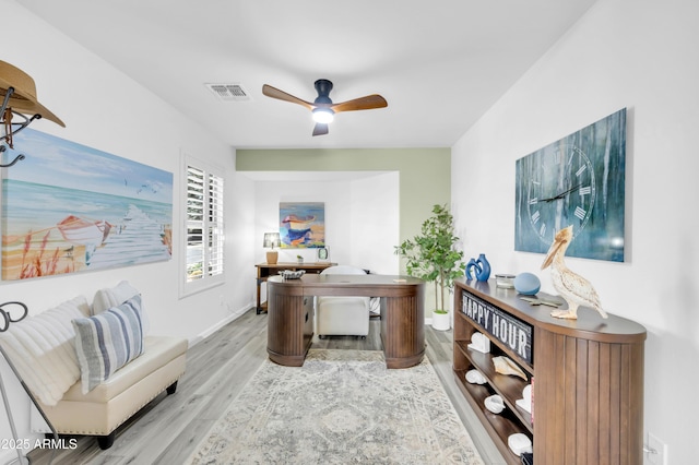 46068 W Guilder Ave, Maricopa, AZ 85139 - home office with wood finished floors and a ceiling fan