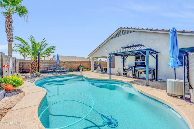 46068 W Guilder Ave, Maricopa, AZ 85139 - view of swimming pool with a gazebo, a patio, and a fenced backyard