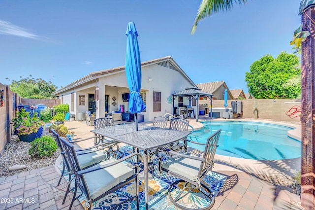 46068 W Guilder Ave, Maricopa, AZ 85139 - view of pool with a gazebo, outdoor lounge area, a patio area, and a fenced backyard