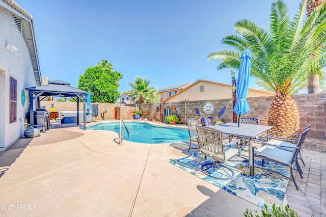 46068 W Guilder Ave, Maricopa, AZ 85139 - view of swimming pool with a gazebo, a patio area, a fenced backyard, and outdoor dining area