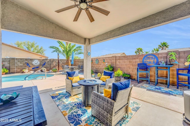 46068 W Guilder Ave, Maricopa, AZ 85139 - fenced backyard with a patio, an outdoor fire pit, and ceiling fan