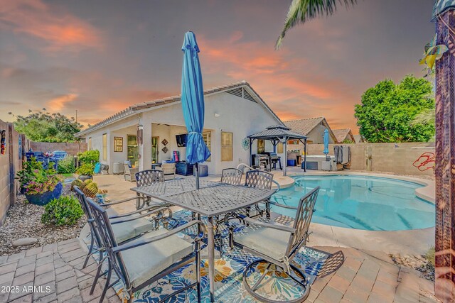 46068 W Guilder Ave, Maricopa, AZ 85139 - view of swimming pool featuring a gazebo, a patio area, a fenced backyard, and an outdoor hangout area