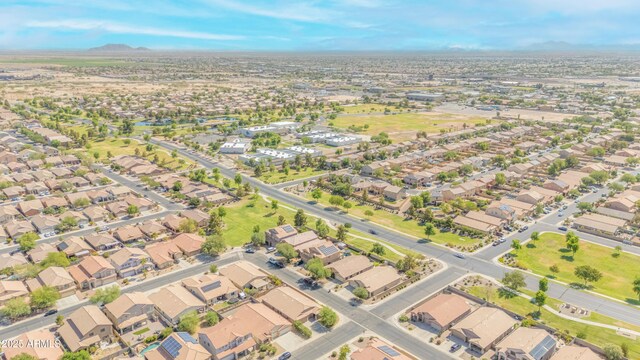 46068 W Guilder Ave, Maricopa, AZ 85139 - aerial overview of property's location featuring nearby suburban area and mountains
