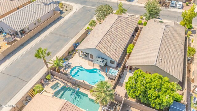 46068 W Guilder Ave, Maricopa, AZ 85139 - aerial perspective of suburban area with a pool area