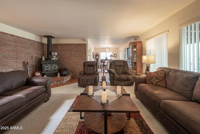 1147 Pedro Ct, Rio Rico, AZ 85648 - living room with carpet flooring and a wood stove