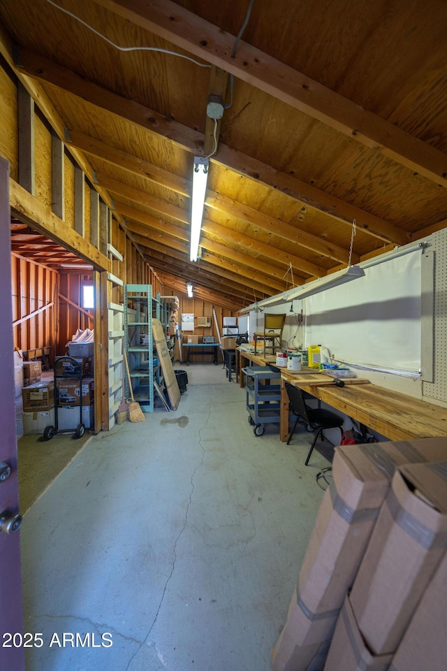 1147 Pedro Ct, Rio Rico, AZ 85648 - misc room featuring a workshop area, concrete floors, and vaulted ceiling