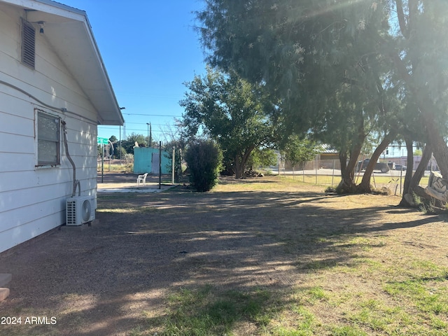 view of yard featuring ac unit