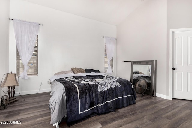 36480 W El Greco St, Maricopa, AZ 85138 - bedroom featuring high vaulted ceiling, multiple windows, wood finished floors, and baseboards
