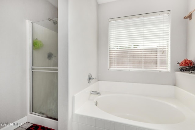 36480 W El Greco St, Maricopa, AZ 85138 - bathroom with a shower stall and a garden tub