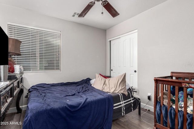 36480 W El Greco St, Maricopa, AZ 85138 - bedroom with a closet, a ceiling fan, wood finished floors, and baseboards