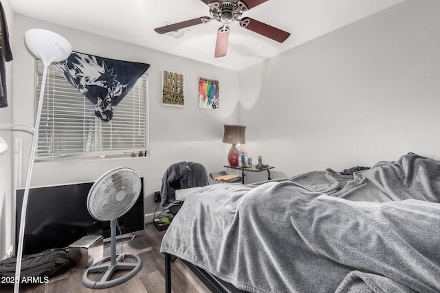 36480 W El Greco St, Maricopa, AZ 85138 - bedroom with ceiling fan, wood finished floors, and baseboards