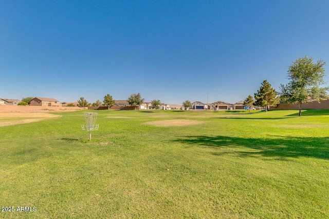 36480 W El Greco St, Maricopa, AZ 85138 - view of home's community with a lawn and a residential view