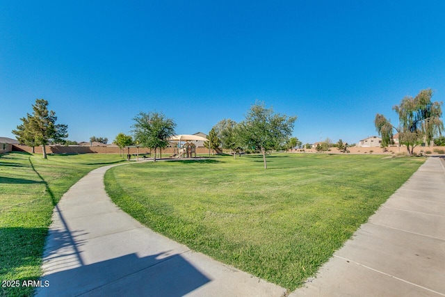 36480 W El Greco St, Maricopa, AZ 85138 - view of home's community featuring playground community and a yard