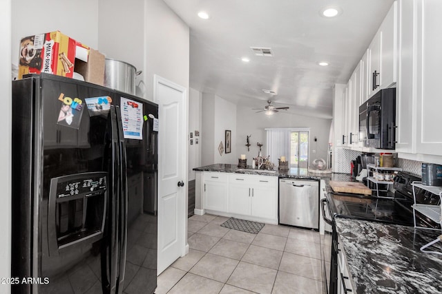 36480 W El Greco St, Maricopa, AZ 85138 - kitchen featuring light tile patterned floors, dark stone countertops, black appliances, visible vents, and white cabinetry