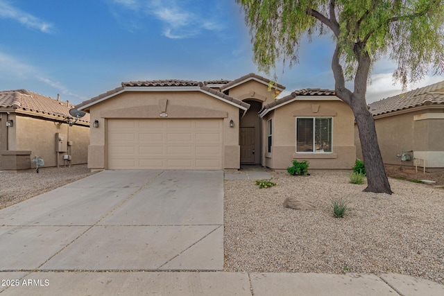 view of front of home with a garage