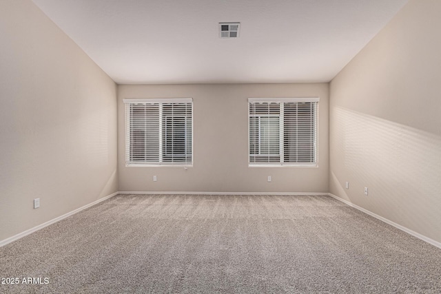 unfurnished room with carpet floors