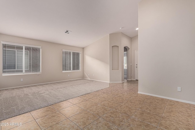 view of tiled spare room