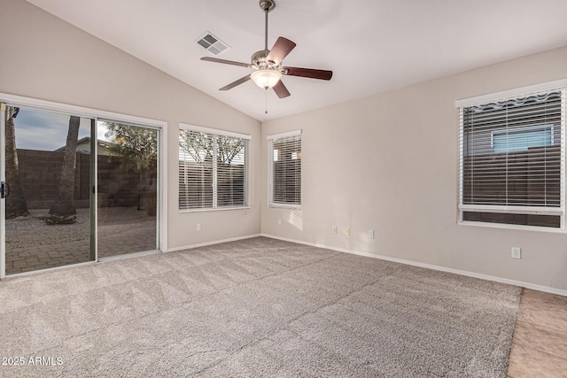 spare room with carpet flooring, ceiling fan, and lofted ceiling