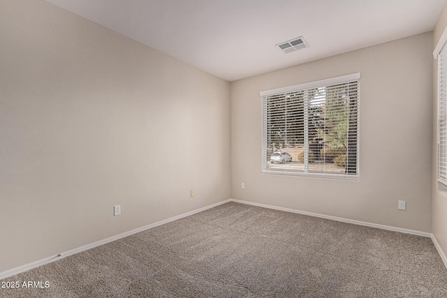 unfurnished room with carpet