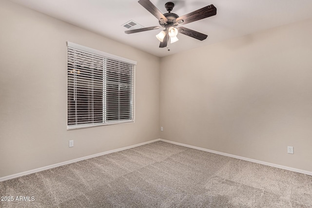 carpeted empty room with ceiling fan