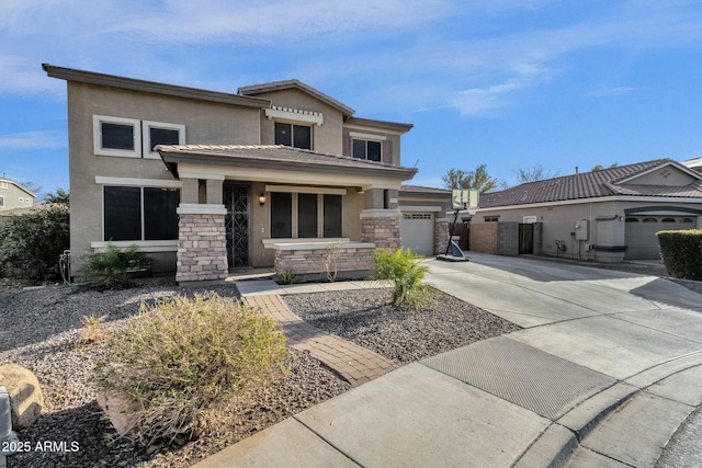 view of front of home with a garage and a porch