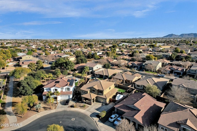 drone / aerial view featuring a mountain view