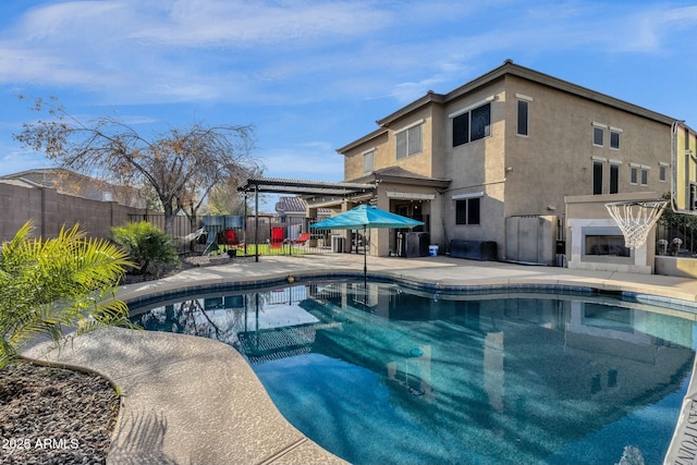 view of pool featuring a patio area and a pergola