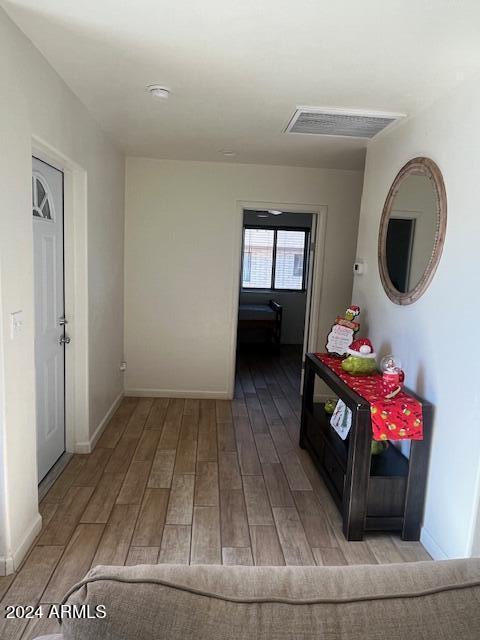 hallway featuring light wood-type flooring