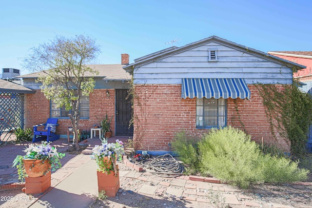 view of front of home with a patio area