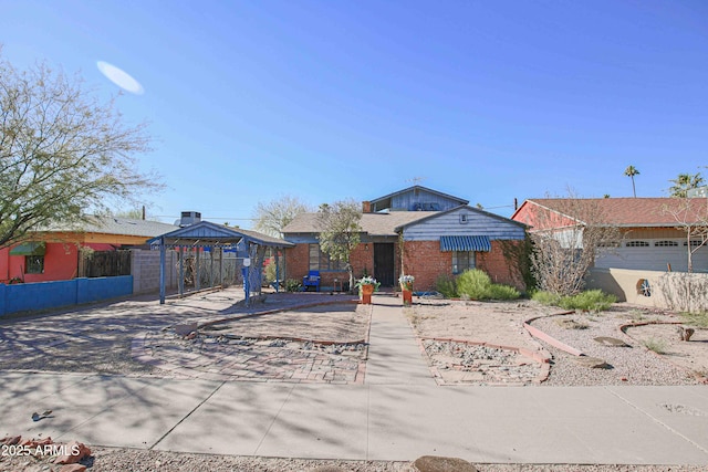 ranch-style house featuring a gazebo and a garage