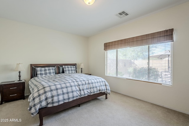 bedroom with light carpet