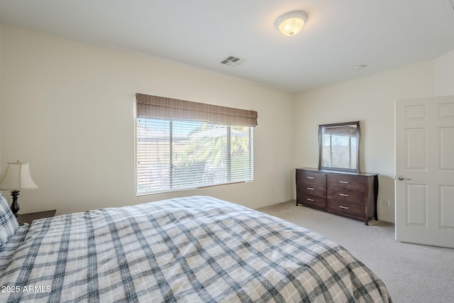 bedroom with light carpet