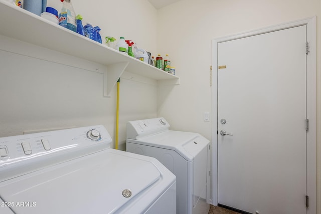 clothes washing area with independent washer and dryer