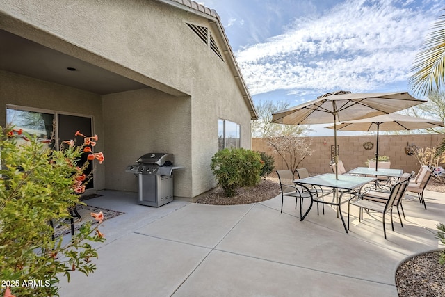 view of patio / terrace featuring a grill