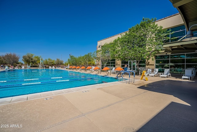 view of pool featuring a patio area