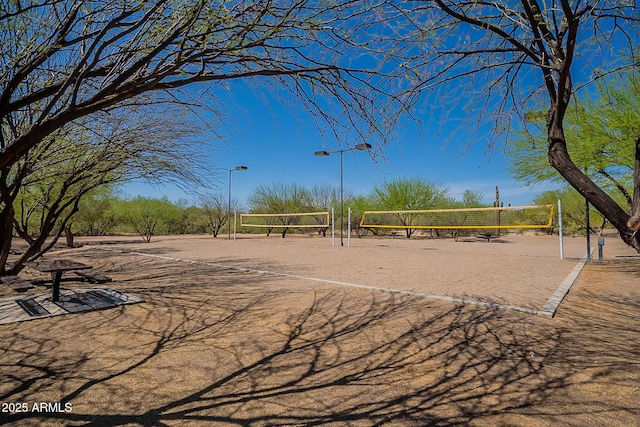 surrounding community featuring volleyball court