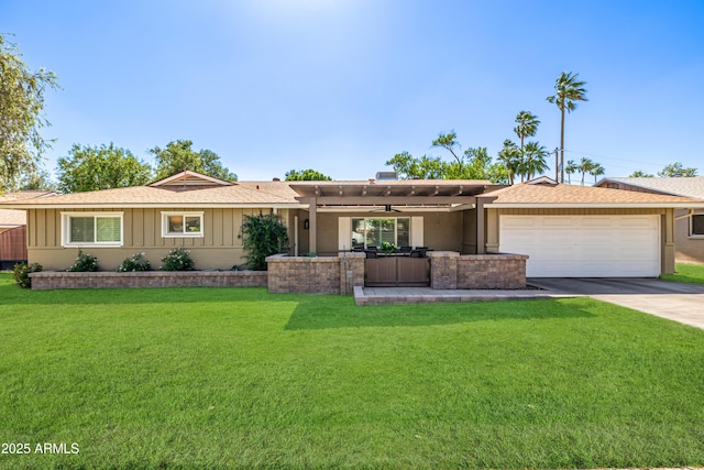 7802 N 6th St, Phoenix, AZ 85020 - ranch-style house with a garage, concrete driveway, a front yard, and board and batten siding