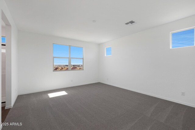 4106 W Eli Dr, San Tan Valley, AZ 85144 - empty room with baseboards, visible vents, and dark colored carpet